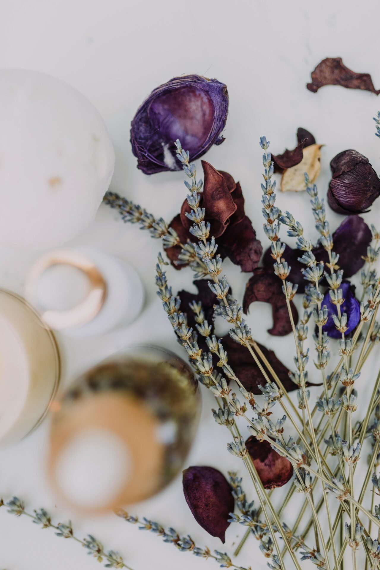 Delicate arrangement of lavender and dried flowers for spa ambiance.